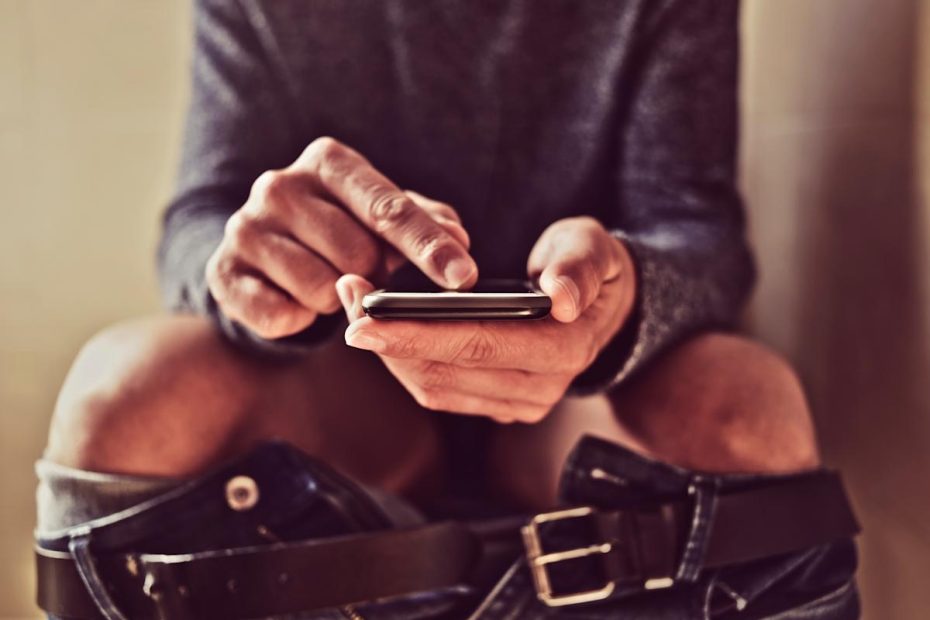 mobilen på toaletten